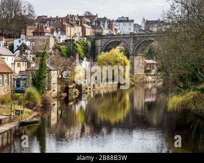 Buildings along Waterside and the railway viaduct at Knaresborough North Yorkshire England Stock Photo