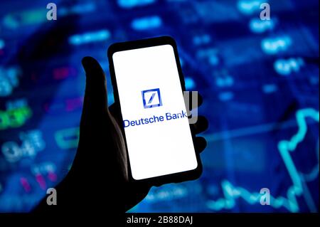 In this photo illustration a Deutsche Bank logo seen displayed on a smartphone. Stock Photo