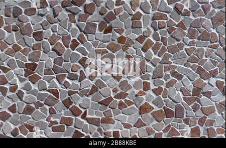 Detail of an industrially manufactured, artificial stone wall Stock Photo
