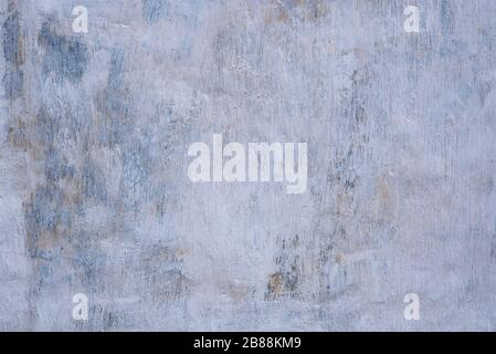 Wall with a layer of whitewash, background, texture. Stock Photo