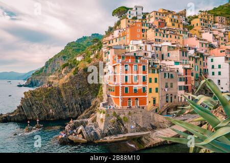 Riomaggiore Cinque Terre Italy , colorful village harbor front by the ocean Stock Photo