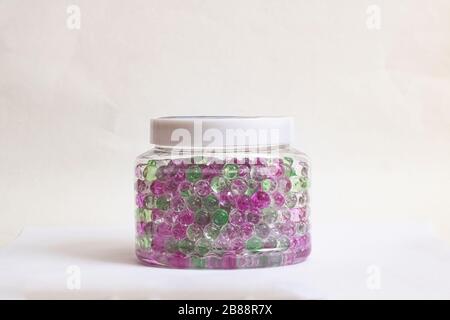 Jar with colored balls of air freshener Stock Photo