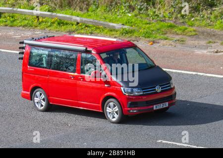 2017 red VW Volkswagen California Ocean TDI BMT; UK vehicular traffic, transport, moving vehicles, vehicle, roads, motors, motoring  on the M6 motorway highway Stock Photo