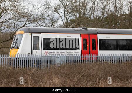 Cardiff, Wales, UK. 20th Mar, 2020. CARDIFF, WALES, UNITED KINGDOM - MARCH 20, 2020 - A Transport For Wales train in Cardiff as many train services are reduced due to coronavirus. Credit: Mark Hawkins/Alamy Live News Stock Photo
