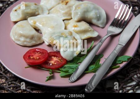 dumplings with potatoes, homemade traditional Ukrainian dish varenyky Stock Photo