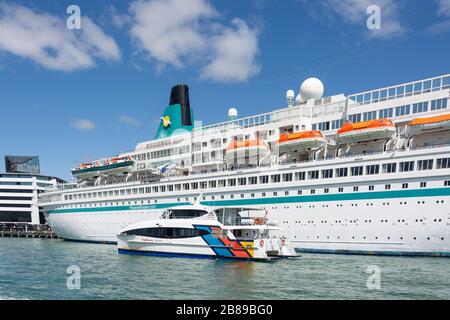 MS Albatross cruise ship and Fullers ferry boat, Auckland Waterfront, Auckland, New Zealand Stock Photo