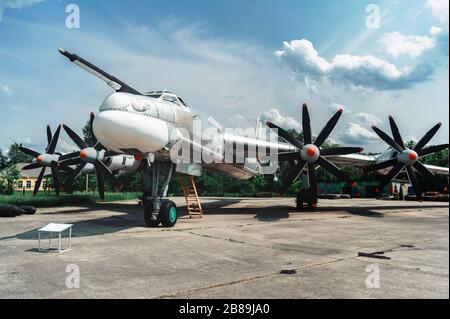 Bear. TU-95. Exhibit of museum of aviation large four engine turboprop-powered strategic bomber and missile platform Stock Photo