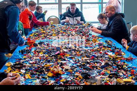 St Joseph Michigan USA March 1 2020; families gather at a Lego event, and play with the colorful bricks to create unique block sculptures and art Stock Photo