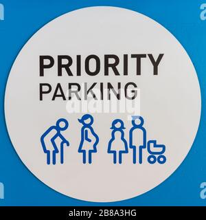 Parking signs for the elderly, disabled, pregnant women, boys and girls. Blue on white background Stock Photo