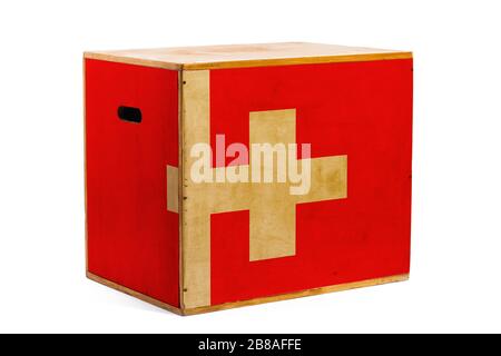 A wooden box for reliable shipment of various goods and cargo with the national flag of Switzerland on a white isolated background. The concept of exp Stock Photo