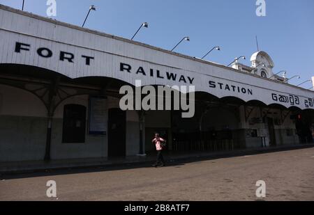 Colombo, Sri Lanka. 21st Mar, 2020. A man Walk an empty street is seen after the authorities announced a weekend curfew in a country as a preventive measure against the spread of the COVID-19 novel coronavirus, in Colombo March 21, 2020. Credit: Pradeep Dambarage/ZUMA Wire/Alamy Live News Stock Photo