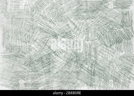 green color crayon doodles on paper background texture Stock Photo