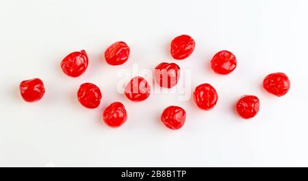 Red candied cherries isolated on white background. Top view. Stock Photo