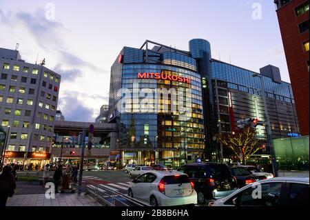 Many department stores are seen from the other side of street in Tenjin area Stock Photo