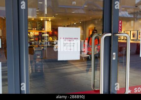 21st March 2020 Harrow, London UK. A customer walking out of Pret a Manger in Harrow On The Hill town Center Today 21/03/2020, PRET is only offering takeaway service due to Boris Johnson MP ordereding Britain Pubs, Bars and Restaurants to close, part of tougher measures to protect citizens from coronavirus. Stock Photo