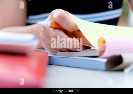 Close up female hands of accountant with calculator and pen. business accounting background. Stock Photo
