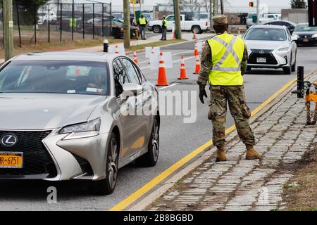 New York, USA. 20th Mar, 2020. The National Guard patrols a new drive-thru coronavirus disease (COVID-19) testing center at the South Beach Psychiatric Center in the Staten Island borough of New York City on Friday, March 20, 2020. Credit: European Sports Photographic Agency/Alamy Live News Stock Photo