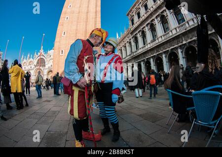 Carnival masks at a traditional festival in Venice Stock Photo