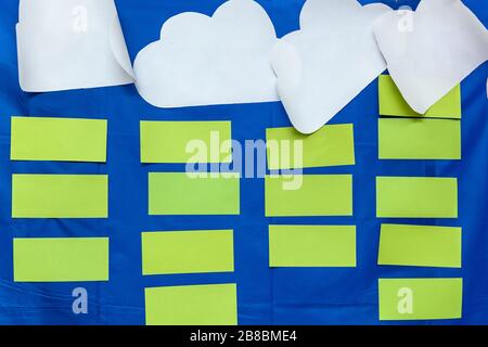 Green and white paper stickers on a blue background, background for the designer Stock Photo