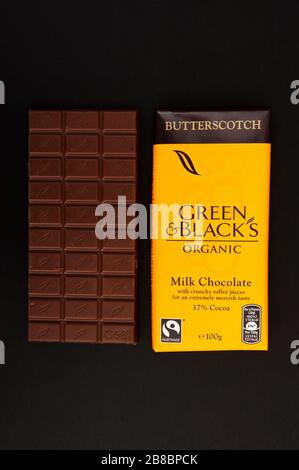 Green & Blacks organic butterscotch milk chocolate Stock Photo