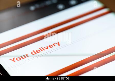 your delivery text on smart phone screen. Stock Photo