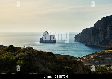 Pan di Zucchero faraglione, a big rock near Masua, Sardinia, Italy Stock Photo