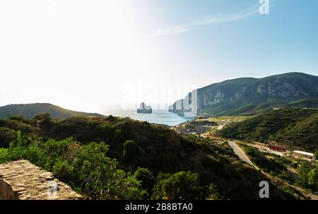 Pan di Zucchero faraglione, a big rock near Masua, Sardinia, Italy Stock Photo