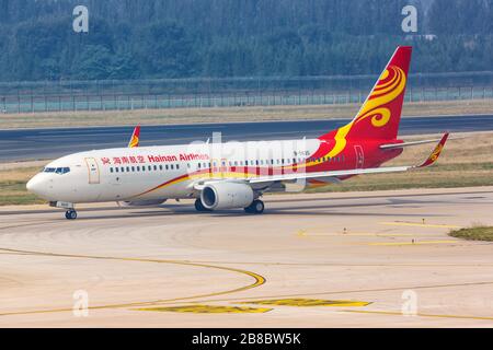 Beijing, China – September 30, 2019: Hainan Airlines Boeing 737-800 airplane at Beijing Capital airport (PEK) in China. Boeing is an American aircraft Stock Photo