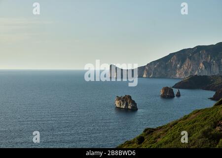 Pan di Zucchero faraglione, a big rock near Masua, Sardinia, Italy Stock Photo