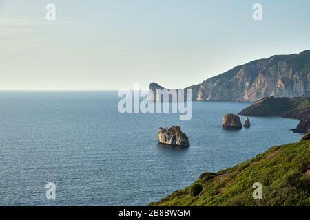 Pan di Zucchero faraglione, a big rock near Masua, Sardinia, Italy Stock Photo