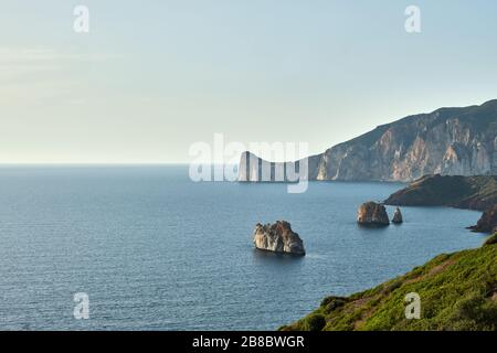 Pan di Zucchero faraglione, a big rock near Masua, Sardinia, Italy Stock Photo