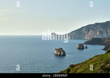 Pan di Zucchero faraglione, a big rock near Masua, Sardinia, Italy Stock Photo