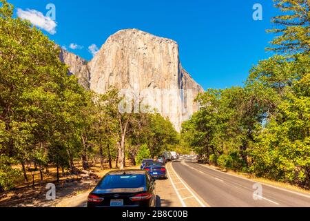 Cars parked along a road leading to El Capitan in Yosemite National Park USA