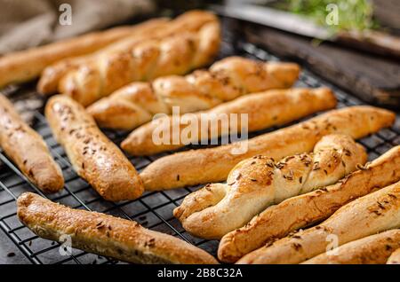 Delicious homemade salted sticks with cumin and sea salt Stock Photo