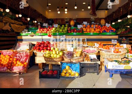 December, 2019 - Ankara, Turkey: Various fruits on the display stand with price tags in a grocery store in Ankara, Turkey. Stock Photo