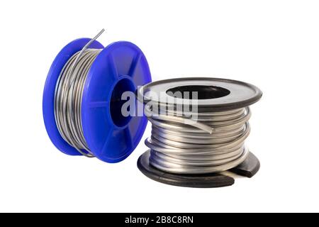 Solder wire spools made of tin and lead isolated on a white background Stock Photo