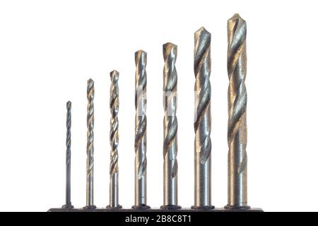 Hardened steel Drill bits set of different sizes isolated on a white background Stock Photo
