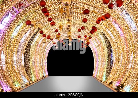 Arch bokeh gold, Blurred arch Bokeh golden light background night arch of lamps LED colorful yellow shine, Backdrop arch door light glitter gold luxur Stock Photo