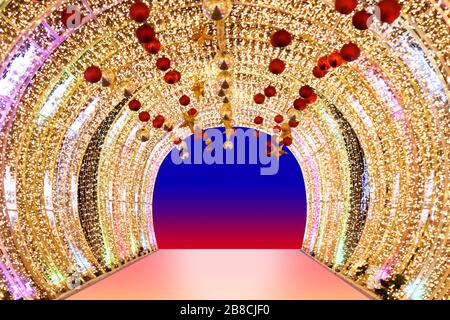 Arch bokeh gold, Blurred arch Bokeh golden light background night arch of lamps LED colorful yellow shine, Backdrop arch door light glitter gold luxur Stock Photo