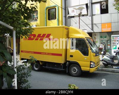 'Deutsch: DHL Lieferwagen in Kōbe, Japan; 29 October 2008; Own work; Anorexia at de.wikipedia; '