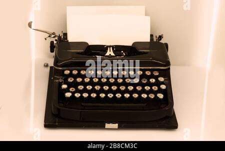 View of an antique manual Underwood typewriter in sepia color Stock Photo