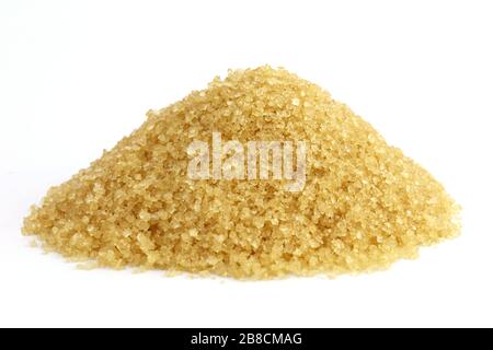 Sugar mountain shape granulated sugar yellow, Pile of brown sugar from sugarcane reed, Sucrose sugar white background Stock Photo