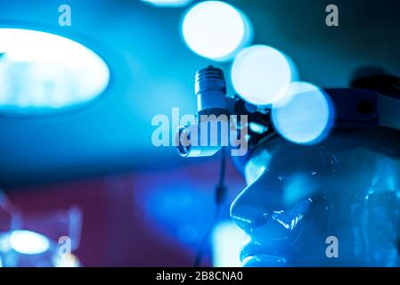 Selective focus of ocular eyepiece lenses and tube of binocular microscope for lab technician in laboratory research in hospital or university. Scienc Stock Photo