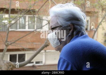 confined at home elderly lady on prevention of coronavirus contagium , Barcelona, Spain. Stock Photo