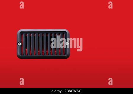 fan air ventilation box of car isolated on red background Stock Photo