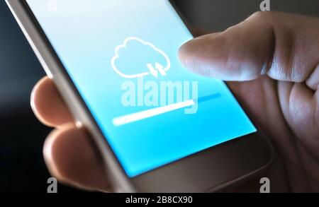 Cloud service for file storage and backup online. Data transfer in mobile phone app with modern wireless technology. Uploading, downloading or sync. Stock Photo