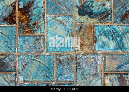 Beautiful Sea Glass inspired turquoise and brown mosaic tile design background. Stock Photo