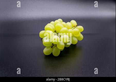 bunch of white grapes on black background Stock Photo