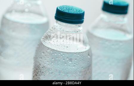 Bottles of cold water with drops on the outside Stock Photo