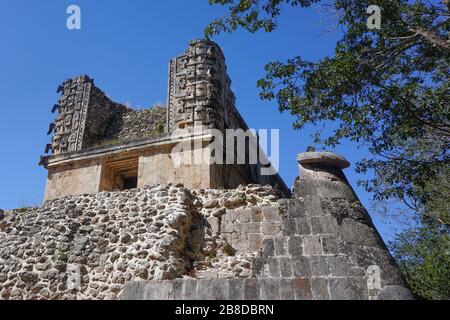 Uxmal, Mexico: Carvings on a building in Uxmal, a major Mayan city, 600-900 A.D. Stock Photo